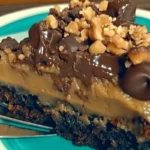German Chocolate Poke Cake with coconut-pecan frosting and chocolate ganache on top
