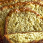 Sliced Cottage Cheese Banana Bread on a plate with a moist texture, showcasing a healthier version of the classic banana bread.