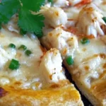 Crab Rangoon pizza with creamy topping and crispy wonton strips